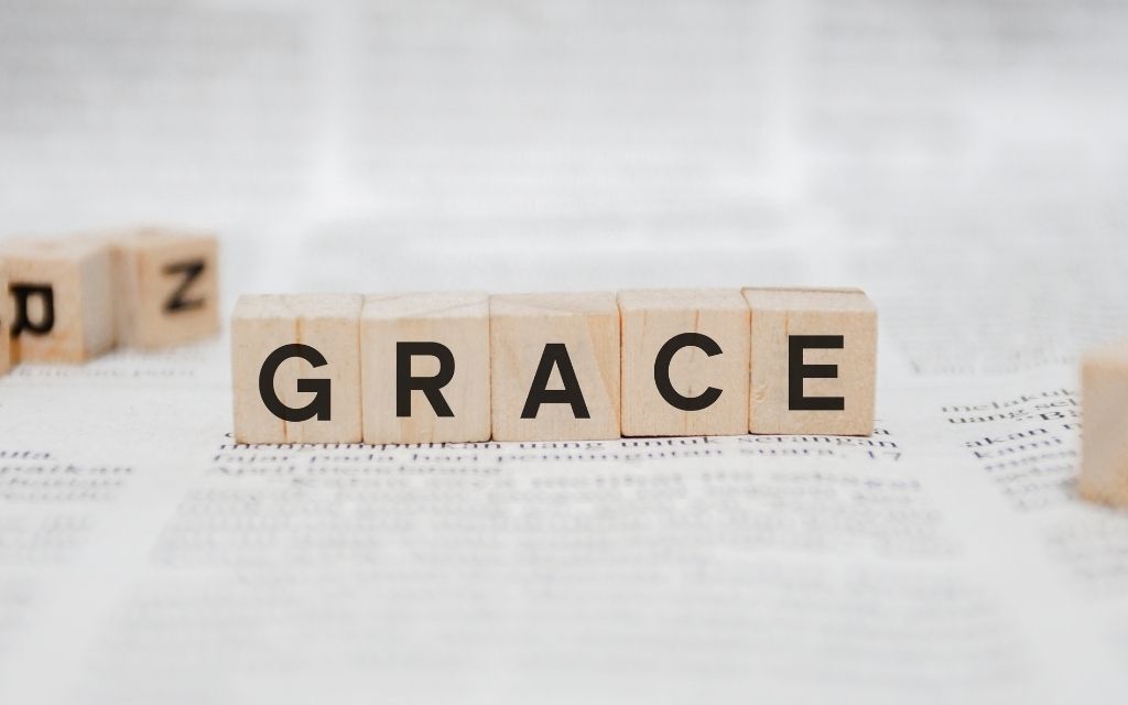 Grace word written on wooden cube